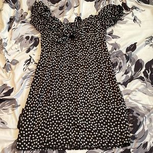 Princess Polly black mini dress with white floral design